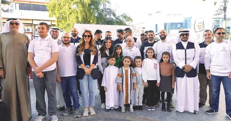 “الكويت للتأمين” توزّع وجبات إفطار بالتعاون مع بنك الطعام في رمضان 1 IMG 7741